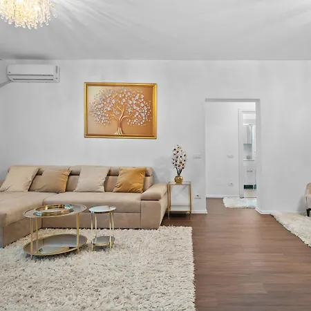 Stylish Gold Accents Apartment Bucharest