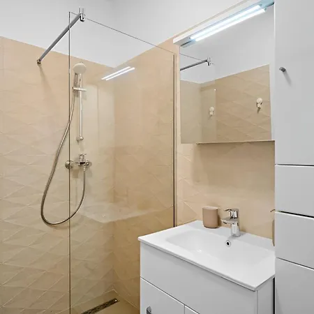 Stylish Gold Accents Apartment Bucharest