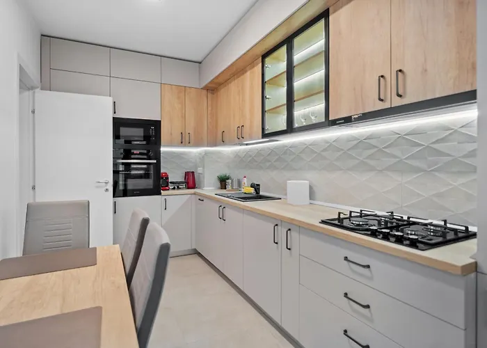 Stylish Gold Accents Apartment Bucharest